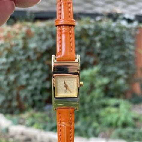 real or fake louis vuitton watch paris plaque or g20m